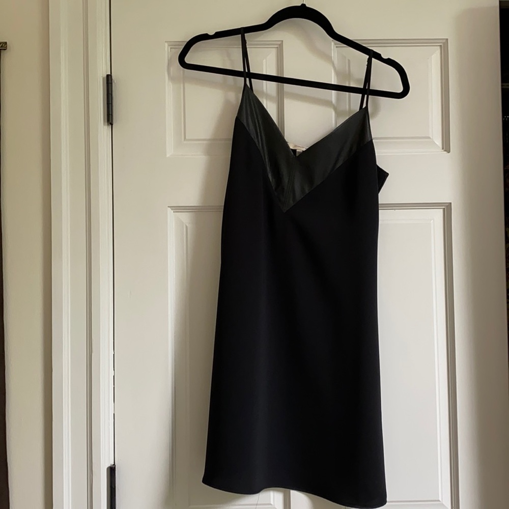 Black slip dress with leather detail